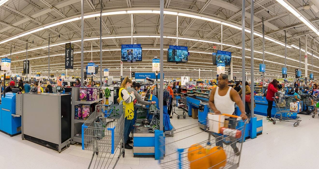 Atdec back-to-back ceiling mounted displays at Walmart in USA