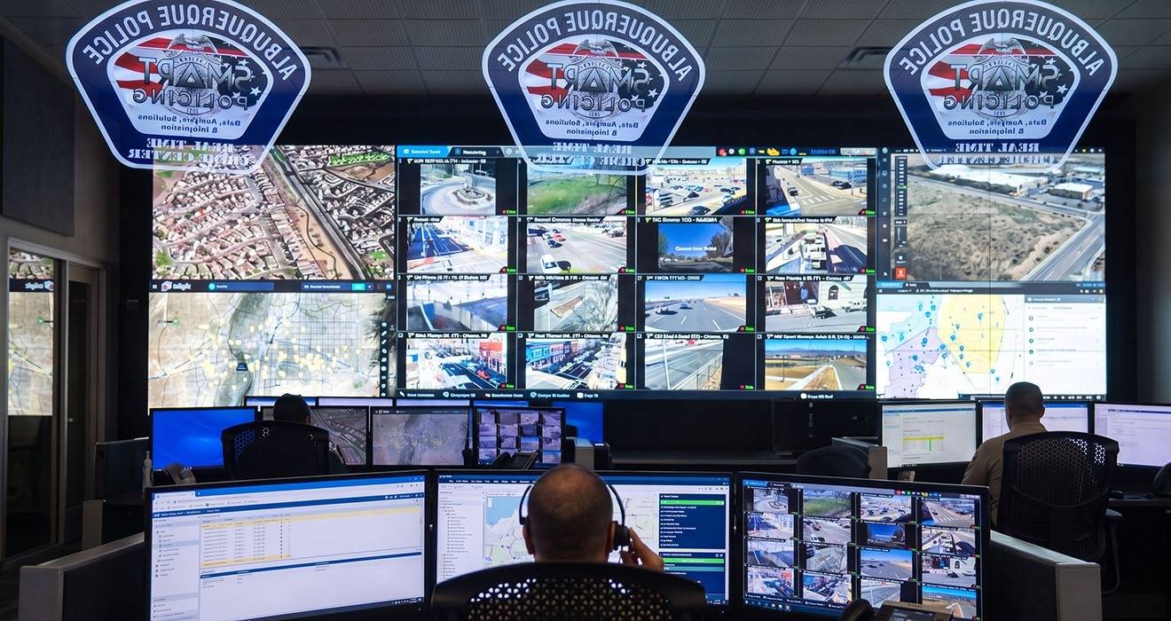 Atdec Modular monitor arms for emergency operations console monitors and wall displays including rail-mounting on consoles