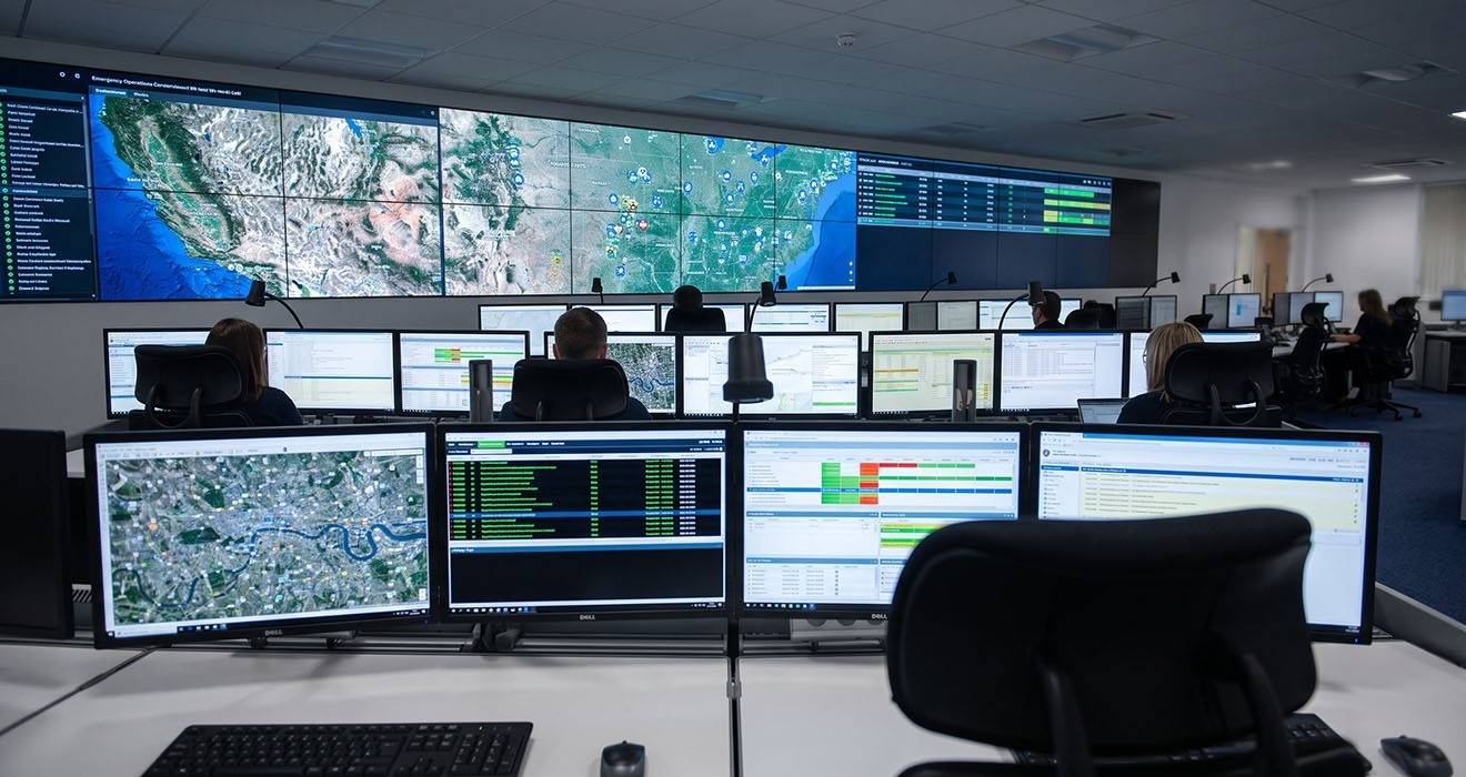 Atdec Modular monitor arms for emergency operations console monitors and wall displays including rail-mounting on consoles