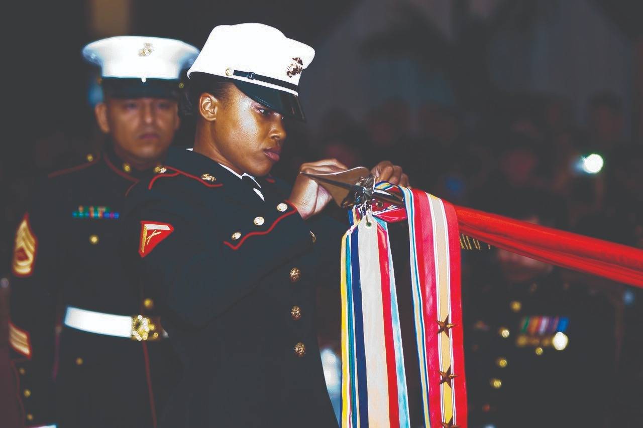 Photograph released by the DoD of a streamer being attached to the Marine Corps unit Combat Logistics Regiment 3’s streamer set.