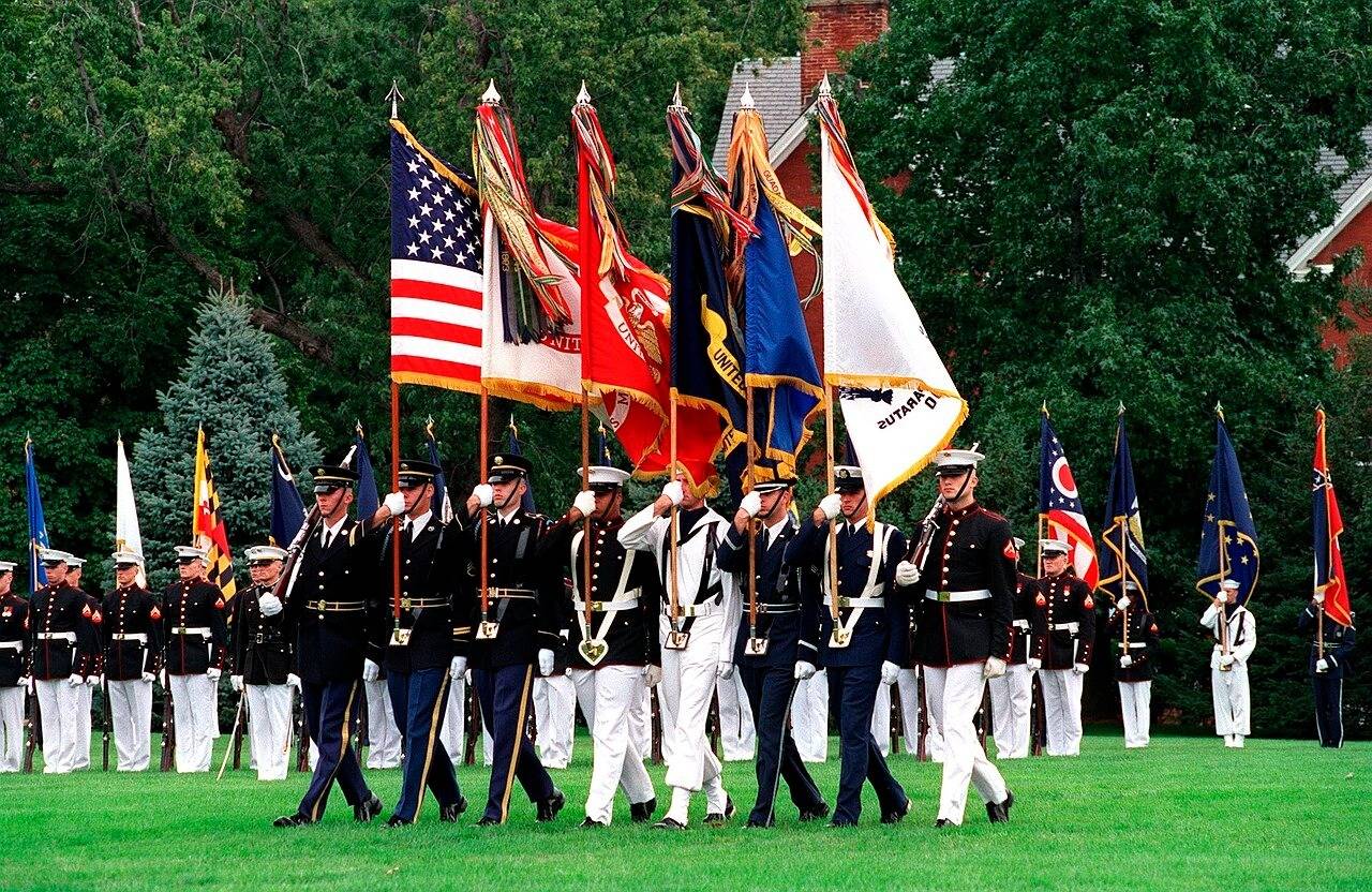 Photograph released by the DoD of a ceremony in 2001, prior to the creation of the Space Force. Each branch’s unique set of campaign streamers is attached to the top of its respective flag.