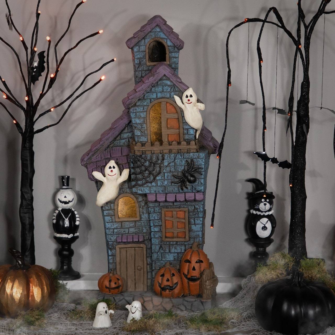 LED lighted haunted house with ghosts Halloween decoration