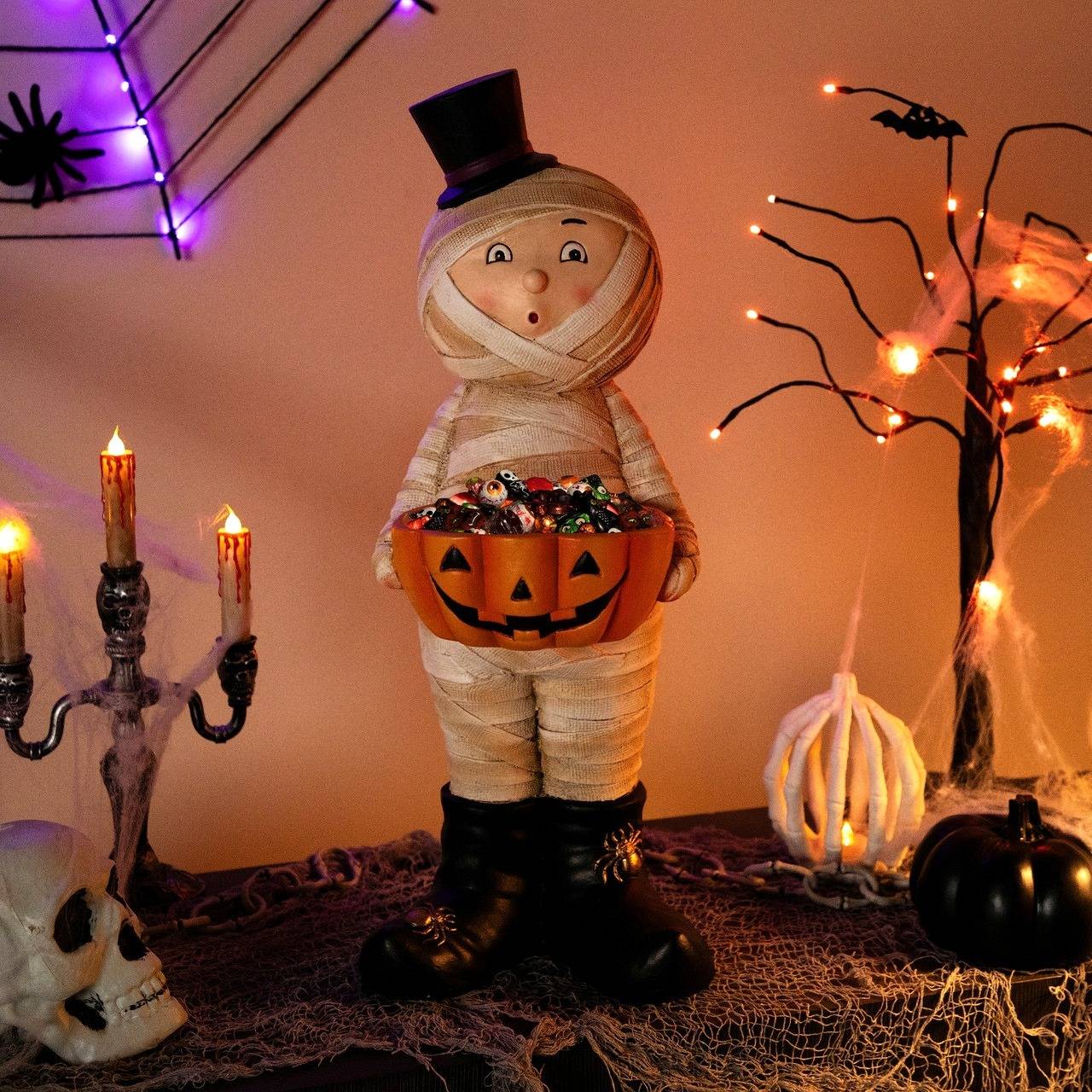 23-inch mummy in top hat holding jack o lantern candy dish